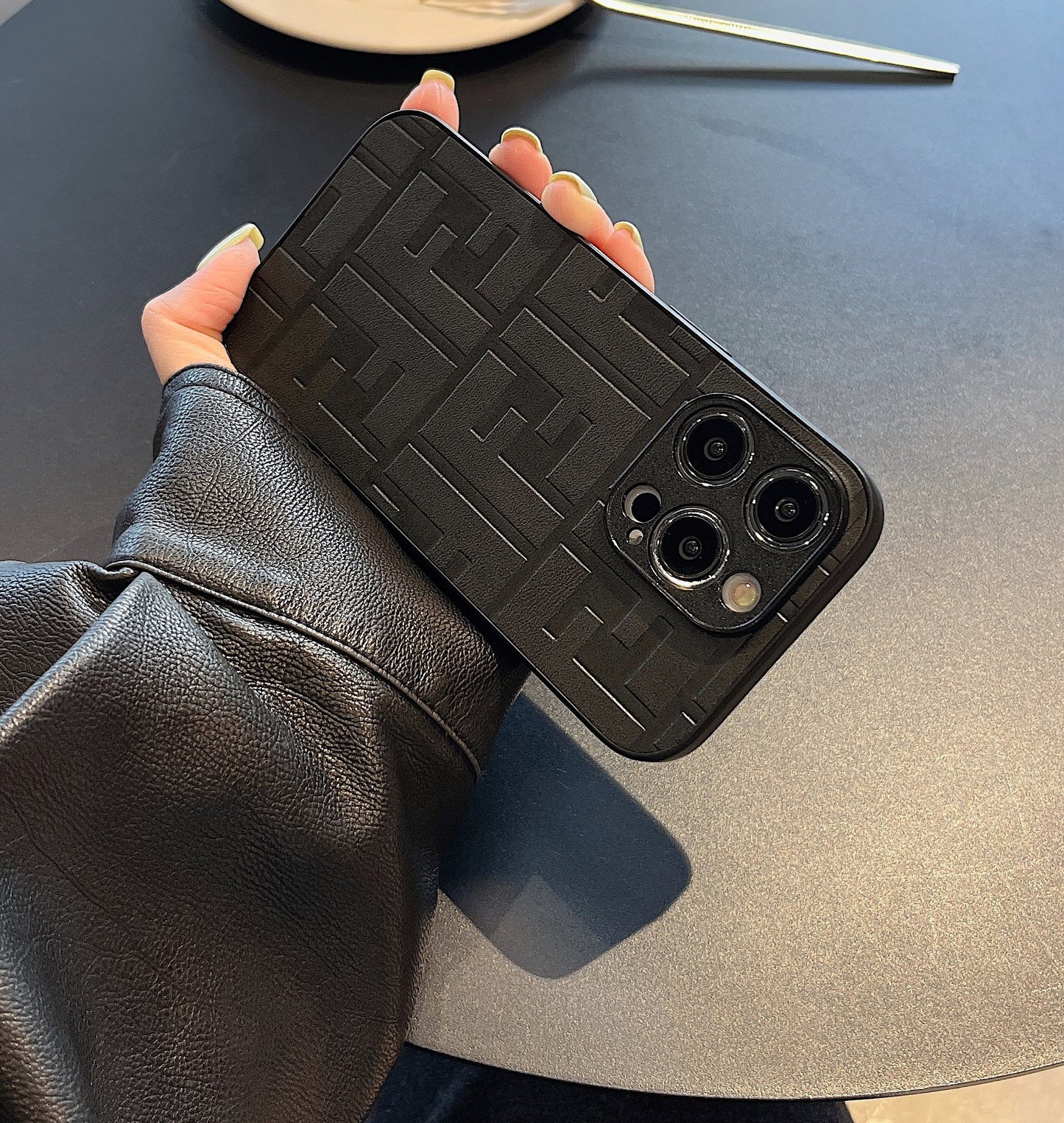 Embossed leather F case