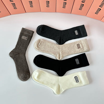 New cashmere embroidery medium long tube stacking socks