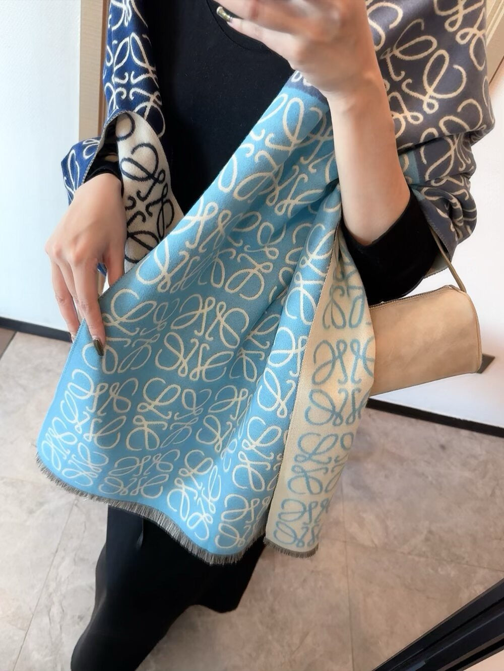 The scarf is very soft, delicate, and comfortable, with mild water ripples!