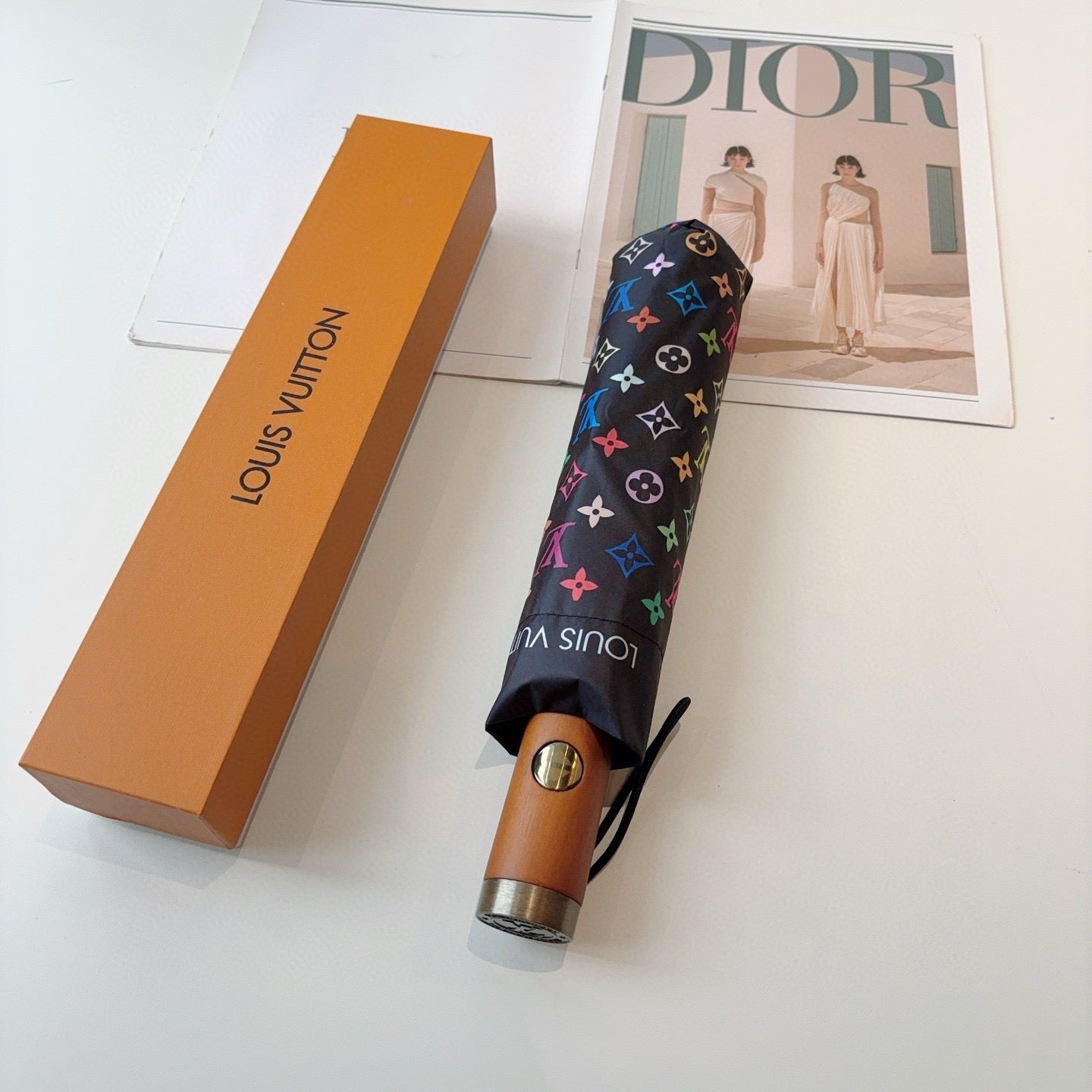 Triple fold automatic folding umbrella