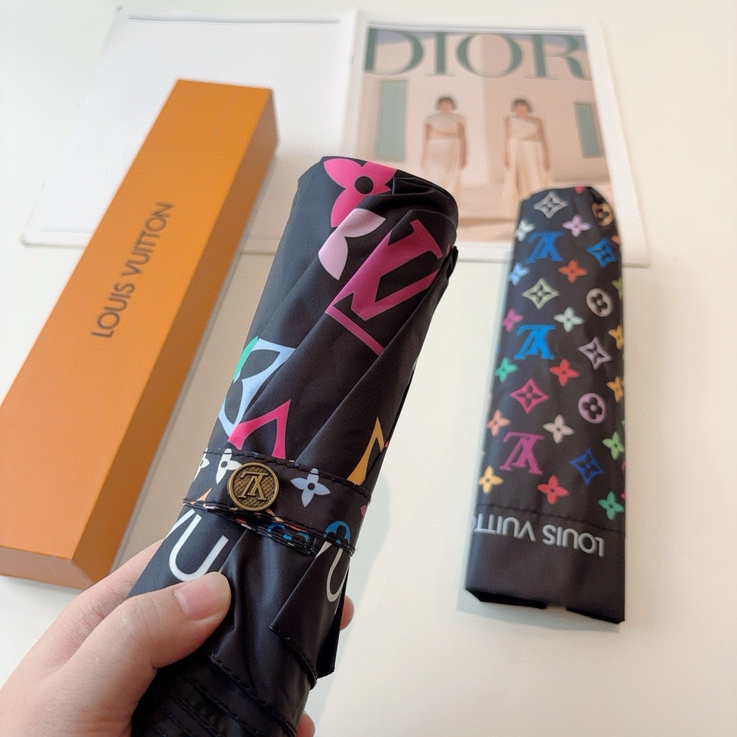 Triple fold automatic folding umbrella