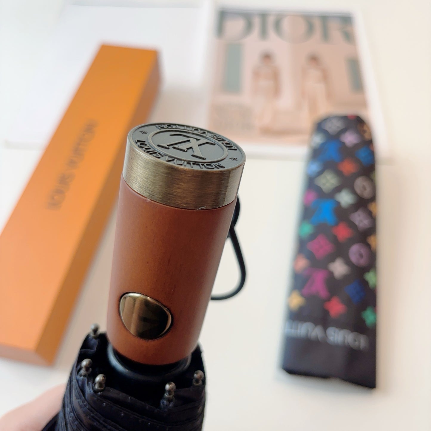 Triple fold automatic folding umbrella