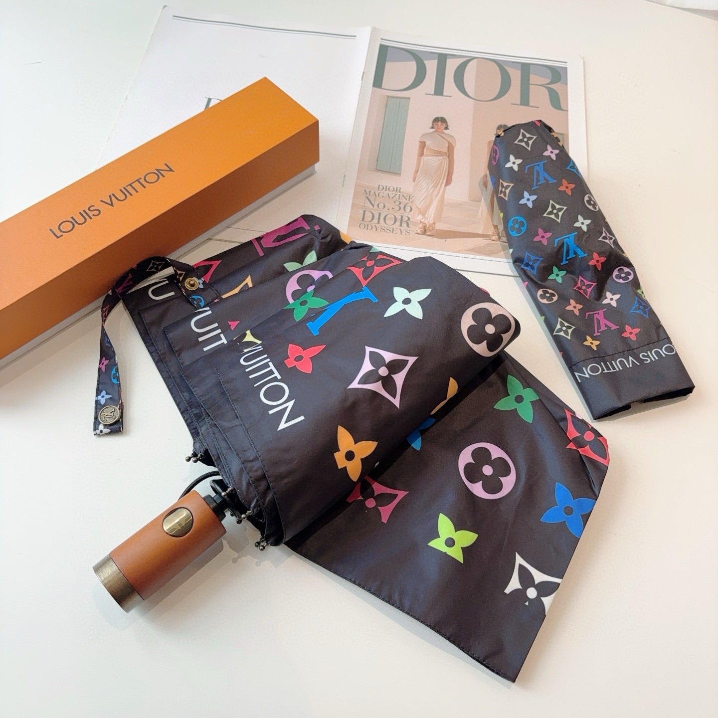 Triple fold automatic folding umbrella