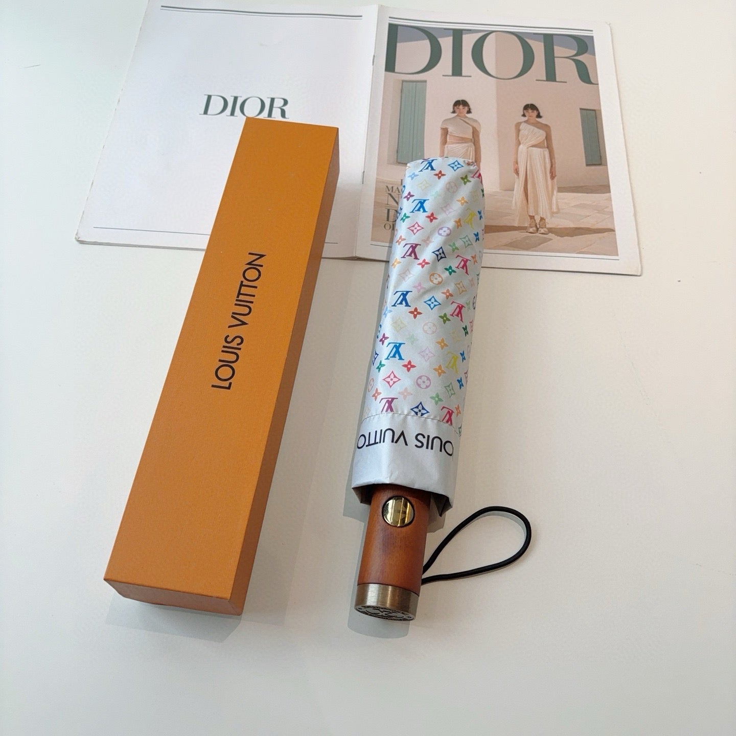 Triple fold automatic folding umbrella