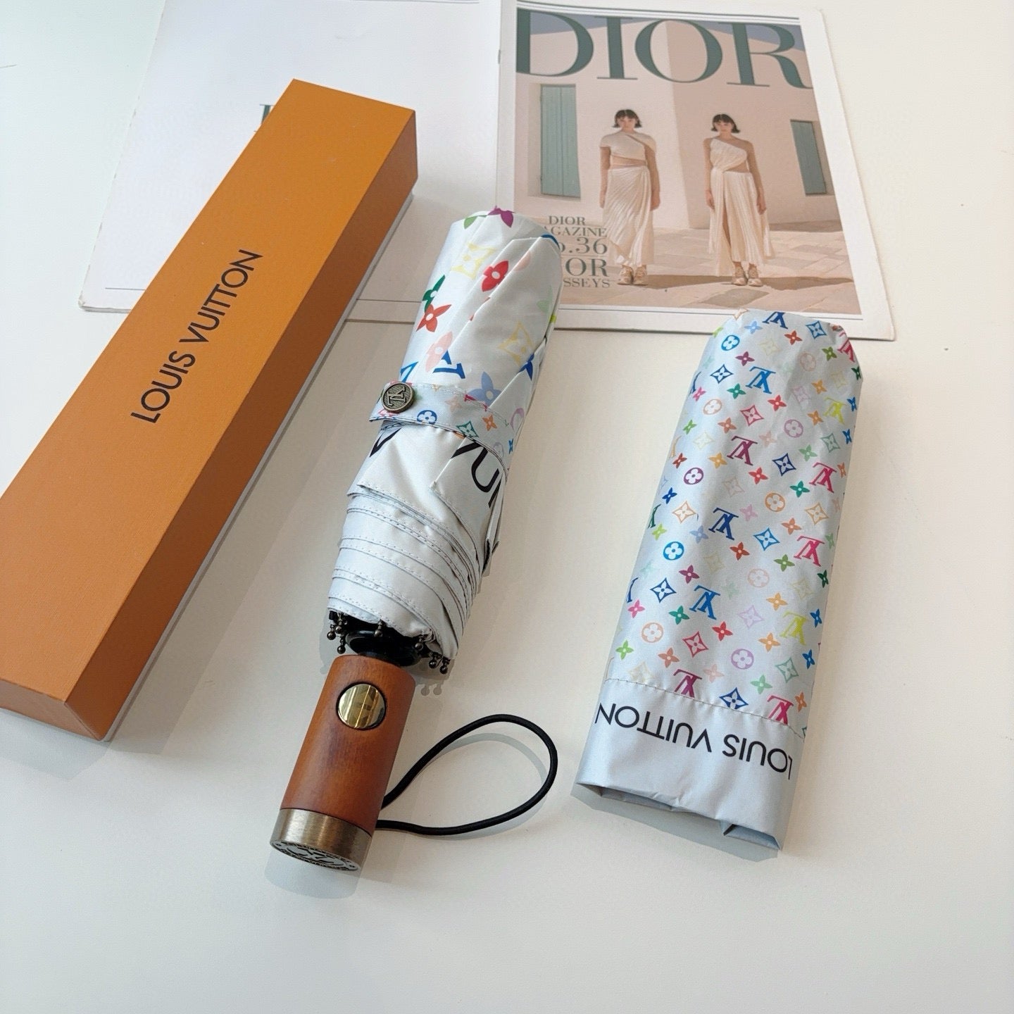 Triple fold automatic folding umbrella