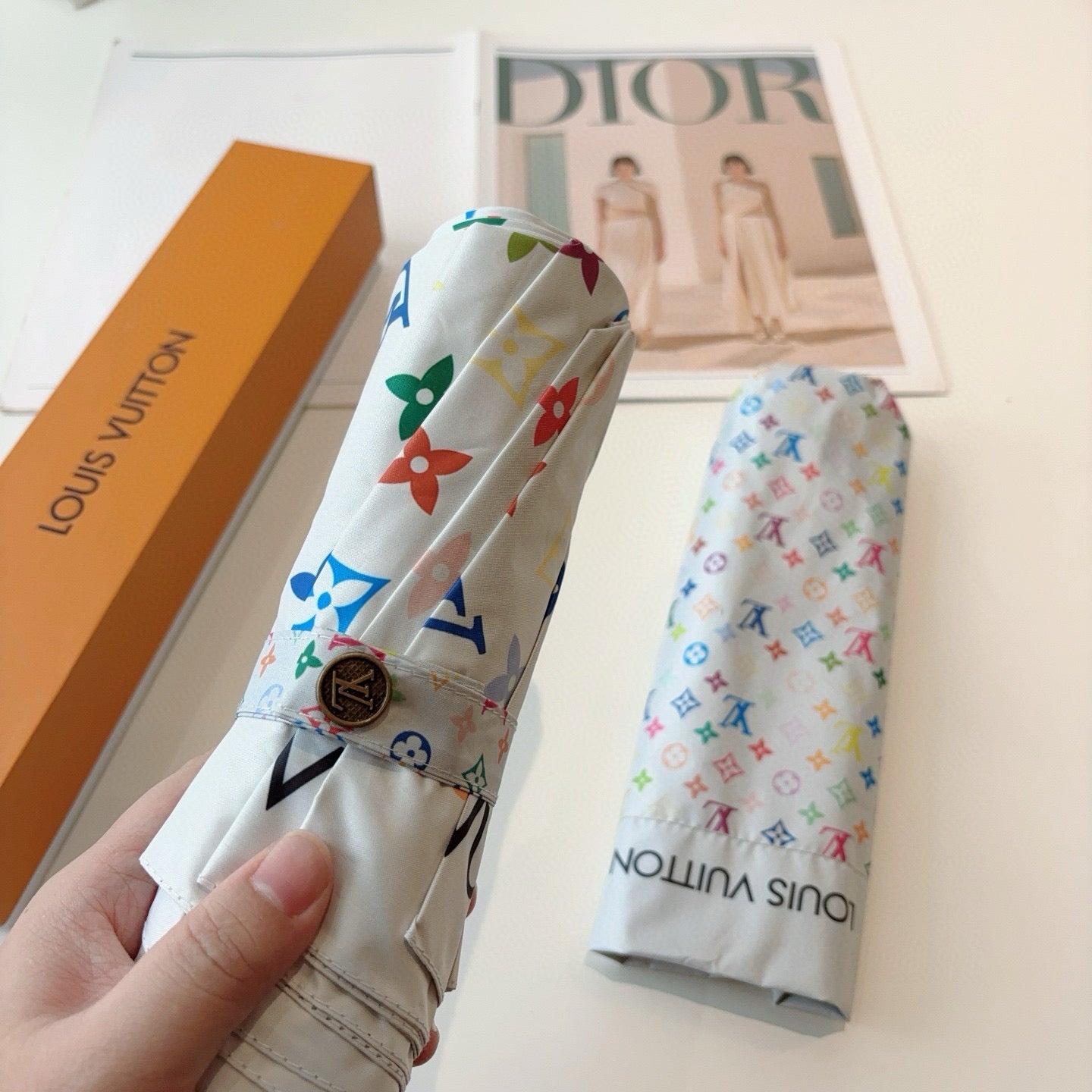 Triple fold automatic folding umbrella