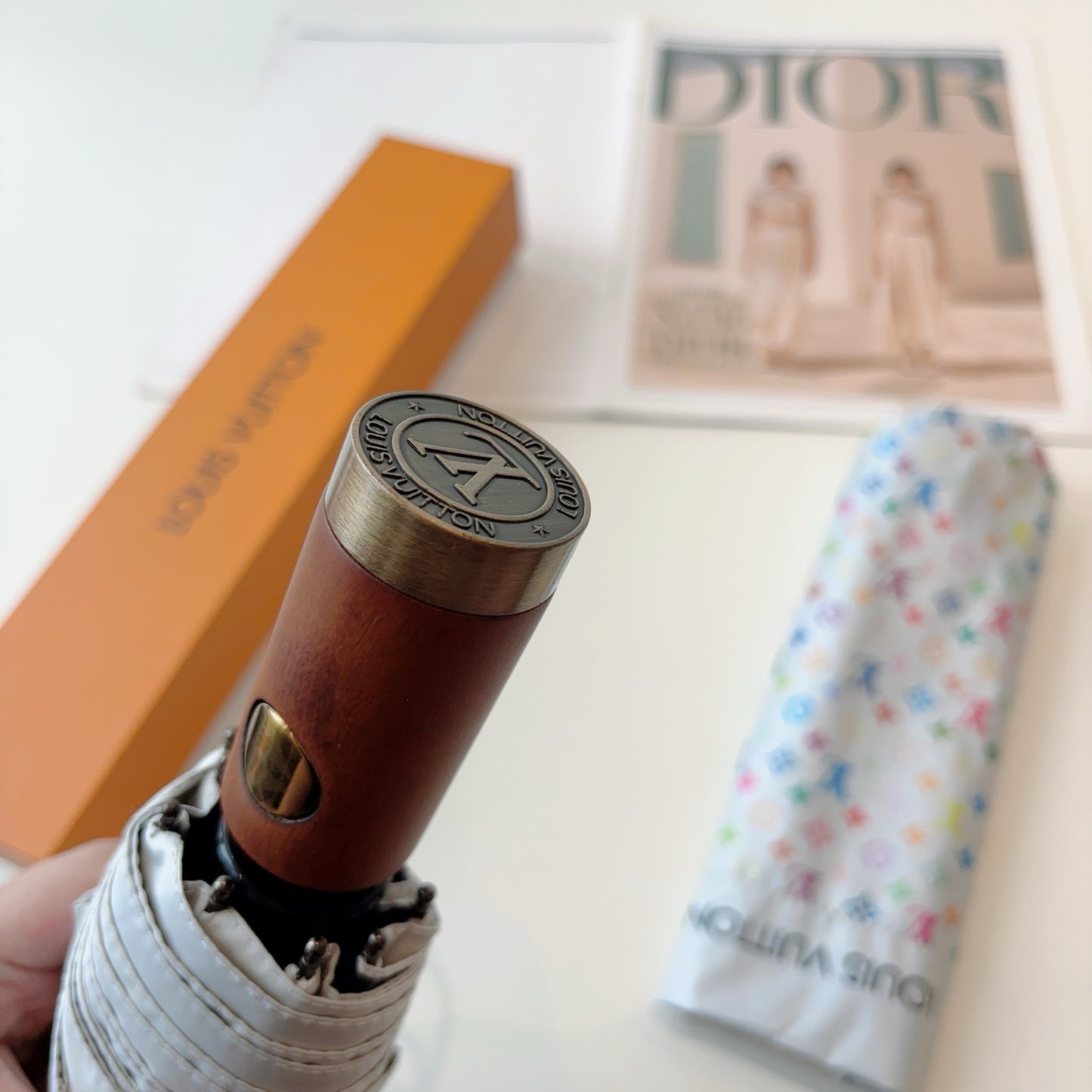 Triple fold automatic folding umbrella