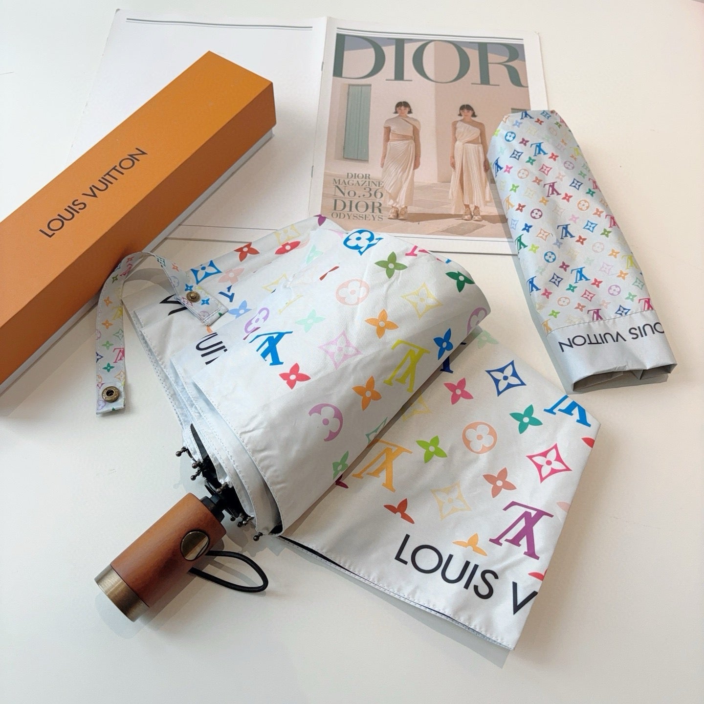 Triple fold automatic folding umbrella