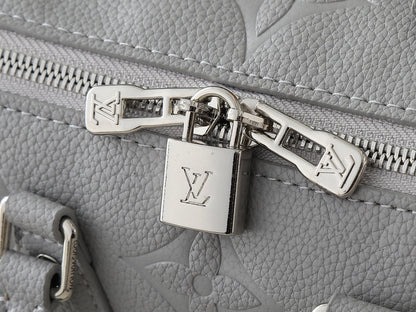 Grey embossed leather bag