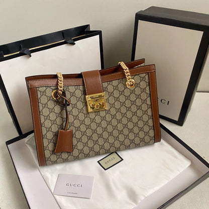 Lockable double strap shoulder bag